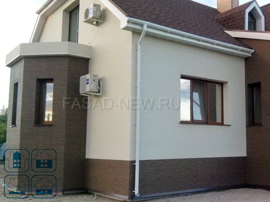 Фото фасада дома облицованного фиброцементными панелями NICHIHA под коричневый камень EFX3353 и белую штукатурку 3Д EFX2952