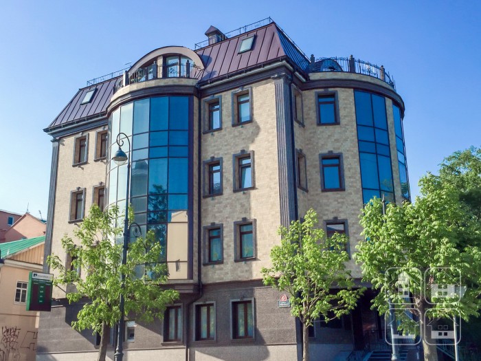Облицовка фасада здания фиброцементными плитами. Владивосток